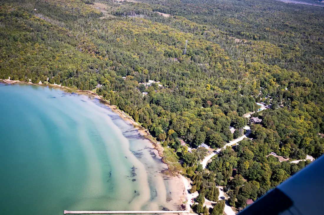 Aerial view of Red Bay and the forest around the lodge