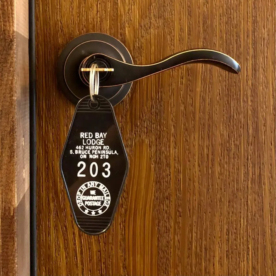 The metal key and tag for lodge room 203